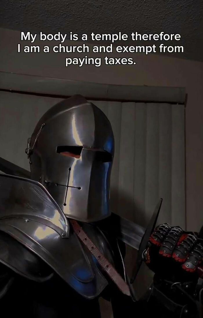 Medieval knight humorously claims tax exemption, wearing full armor with a sword raised.