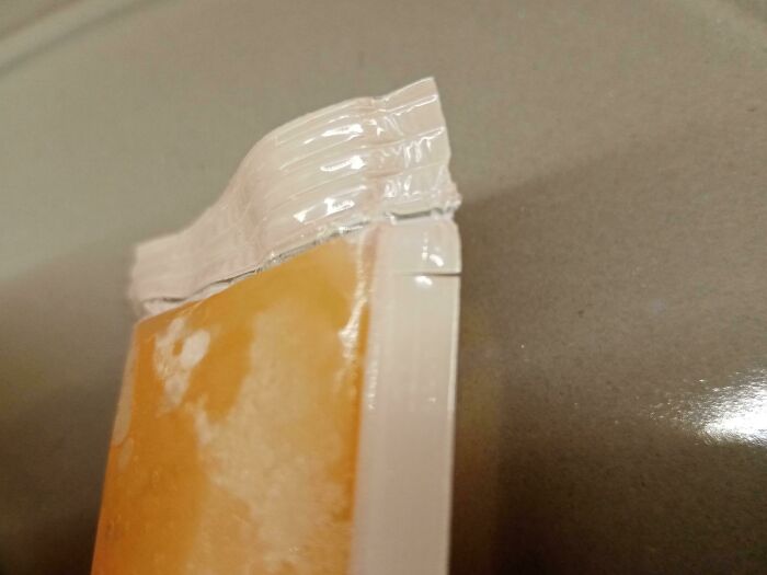 Cut A Slit In Your Freeze Pop And Tear It To Avoid Needing To Wash The Scissors