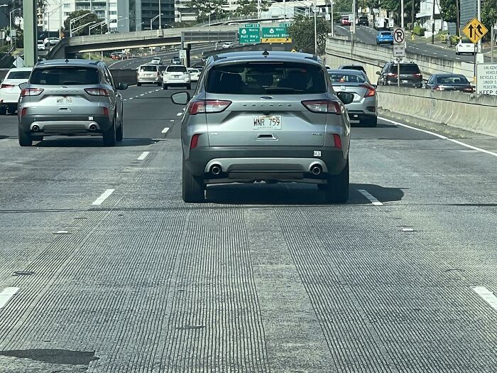 Same Cars With The License Plate Numbers Being One Number Away