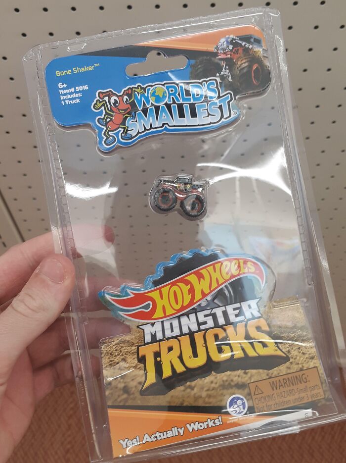 Tiny Hot Wheels monster truck toy in packaging labeled world's smallest, showcasing packaging fails.