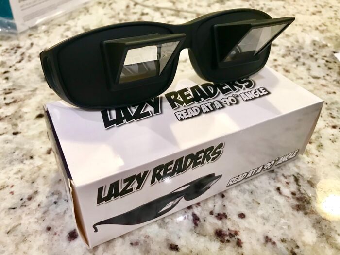 Lazy Readers glasses on a marble surface, perfect unconventional gift for your weirdo friends.