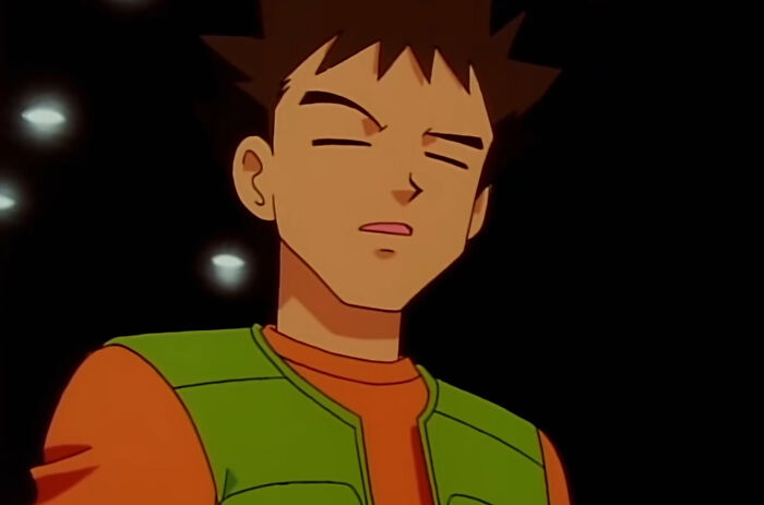 Brock Harrison's eyes are closed and a black background - 48