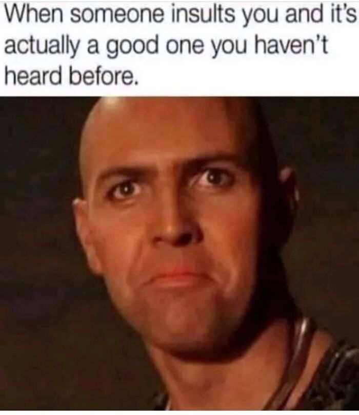 Bald man with a confused face, reacting to a clever insult, illustrating relatable memes for socially awkward friends.