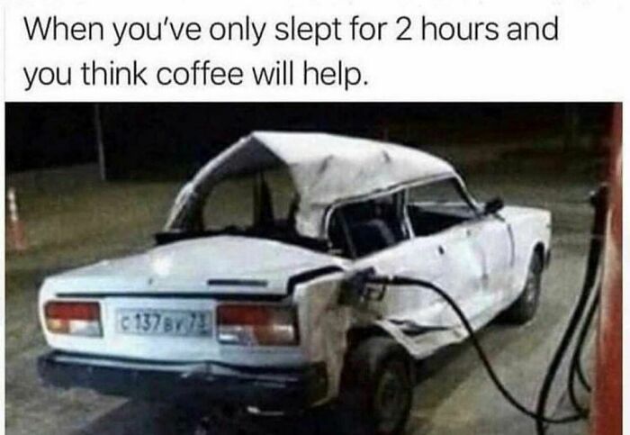 Damaged white car refueling at a gas station, illustrating a confusing and unsettling moment with dark humor.