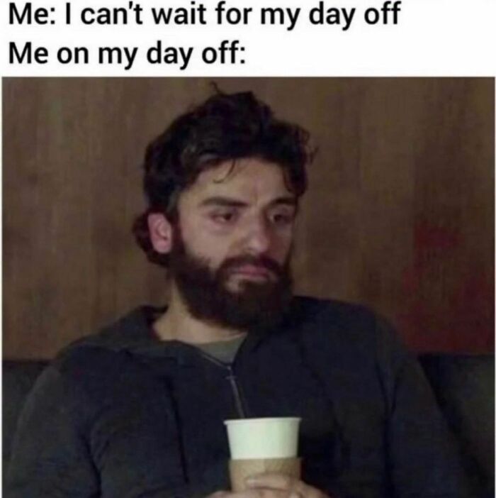 Man with a beard looking tired and sad, holding a cup, illustrating a confusing and unsettling day off moment.