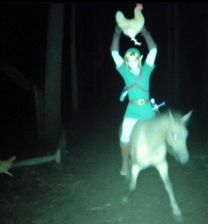 Character on horseback holding a chicken in a dark forest, embodying hilariously cursed AI image vibes.