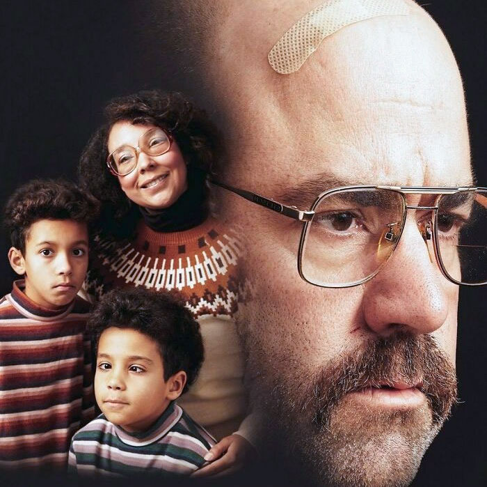 Retro family portrait with children in striped shirts and a dad with glasses and a bandaged head for hilarious family photos.