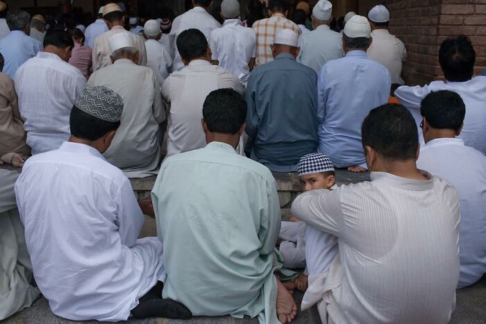 A Photograph Of Men Parying