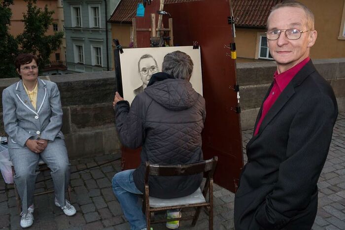 A Photograph Of A Street Artist