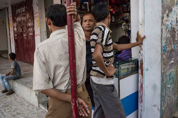 A Photograph Of Men On The Streets