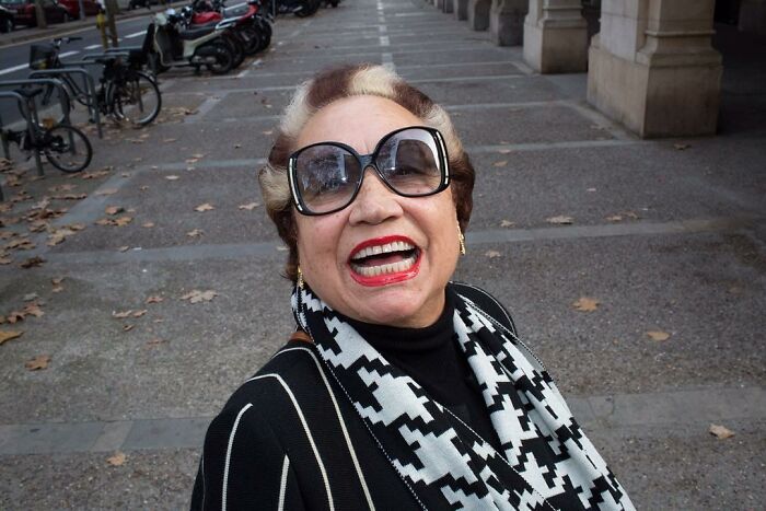 A Photograph Of A Woman Smiling