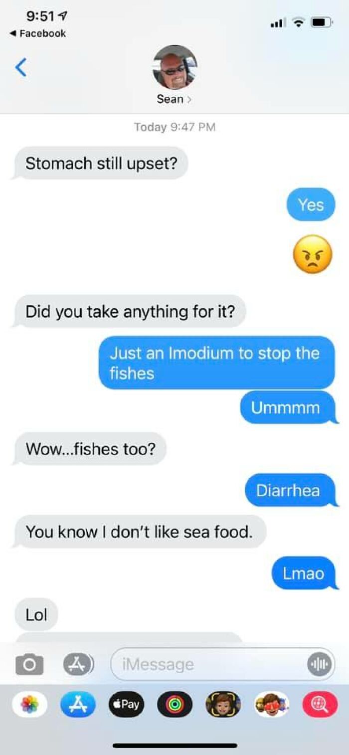 Text message showing autocorrect error where diarrhea is humorously mistaken as fishes in a conversation about stomach upset.