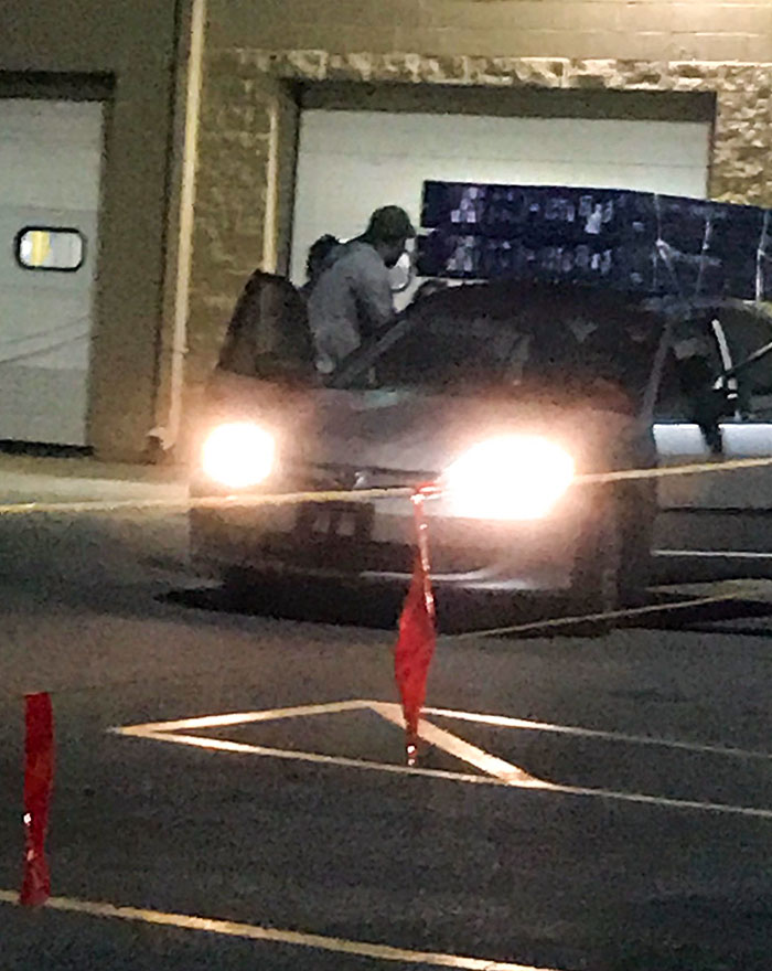 These Dudes Are Trying To Put Two 65" TVs On The Top Of Their Honda Civic. Just Unreal