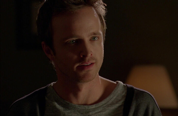 Jesse wearing gray shirt looking from Breaking Bad