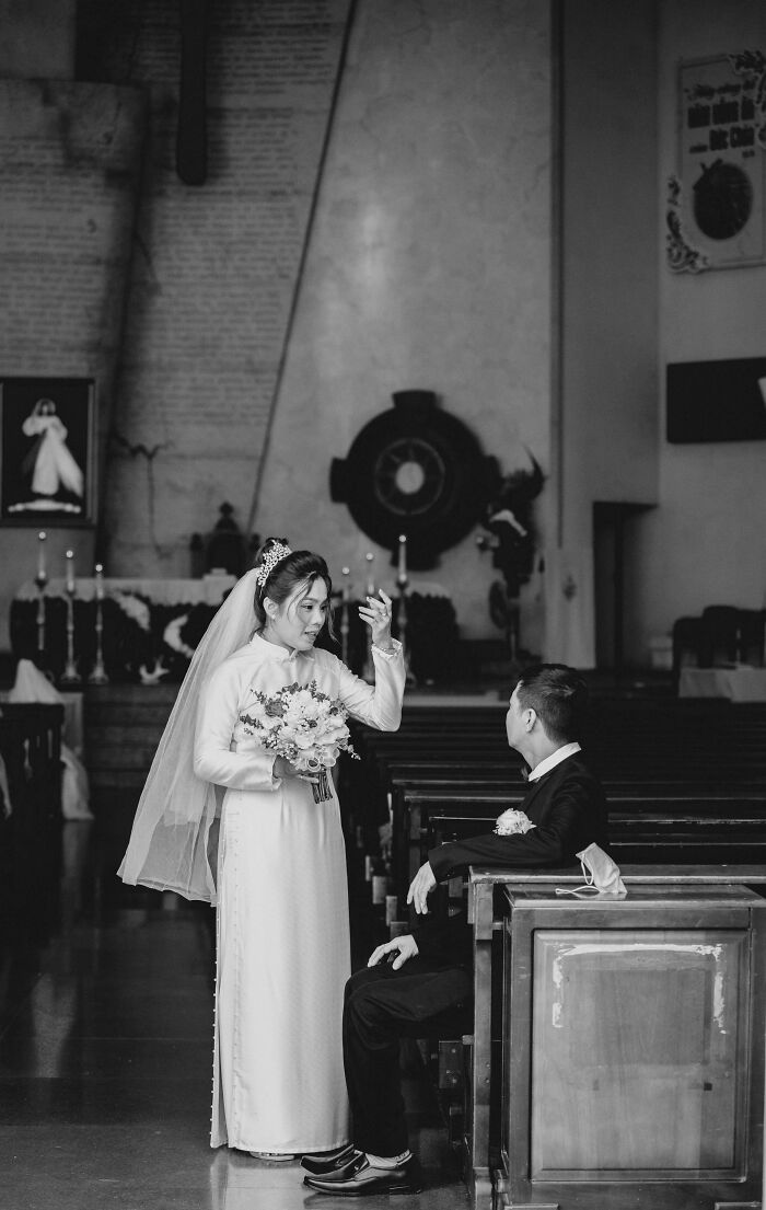 Bride and groom in a church during a wedding ceremony, capturing moments that suggest a potential divorce ahead.