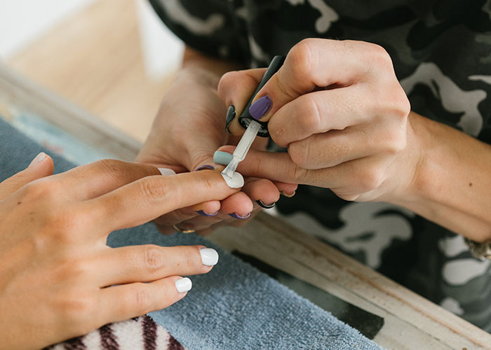 "She's Being A Complete Clown": Woman Is Furious And Offended Coworker Won't Give Free Manicure