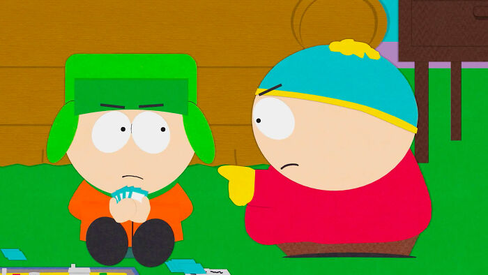 Eric pointing and Kyle playing from South Park