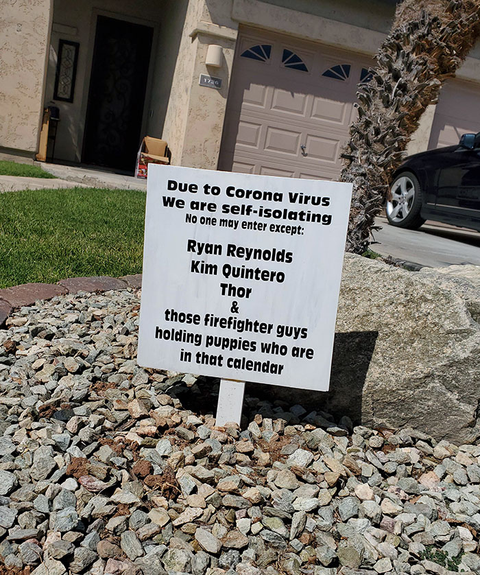 Humorous parent-made isolation sign, listing exceptions like celebrities and firefighters with puppies.