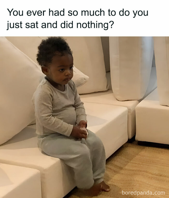 A relatable meme of a child sitting on a couch with a blank expression.
