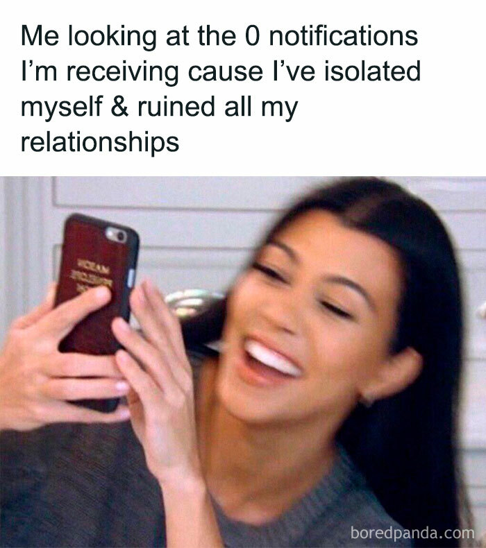Woman laughing at phone screen, humorous meme about social awkwardness and isolation.