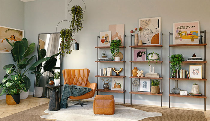 Room with brown and black armchair beside white wooden shelf