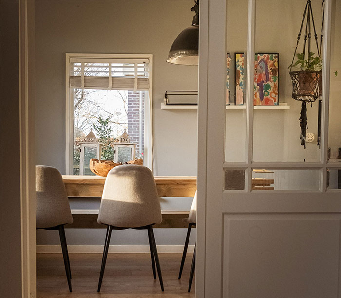 Room with chairs and wooden table
