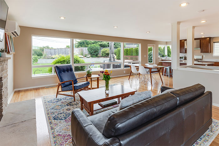 room with brown leather couch in front of brown wooden coffee table