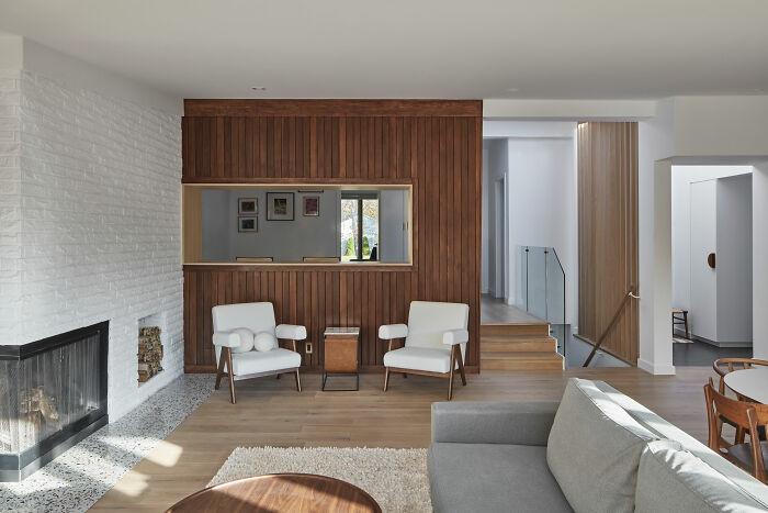 Room with fireplace, gray couch, and brown decor showcasing expert-approved interior design ideas for stylish home designs.