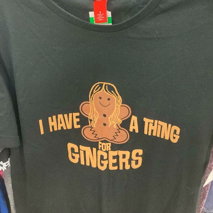 Black T-shirt with a gingerbread man and text I have a thing for gingers, a weird thrift store donation item