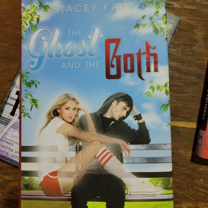 Book cover of The Ghost and the Goth with two young adults sitting on a bench, representing weird items donated to thrift stores.