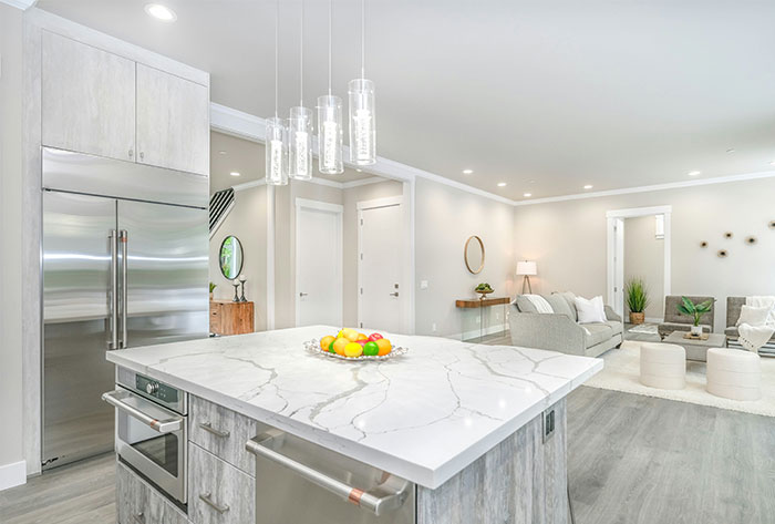 Kitchen with white marble countertop Kitchen with white marble countertop