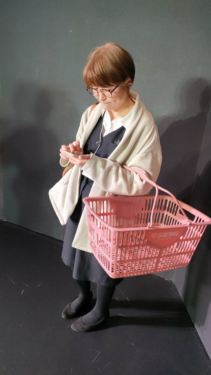 An Office Worker At The Supermarket In The Evening After Work