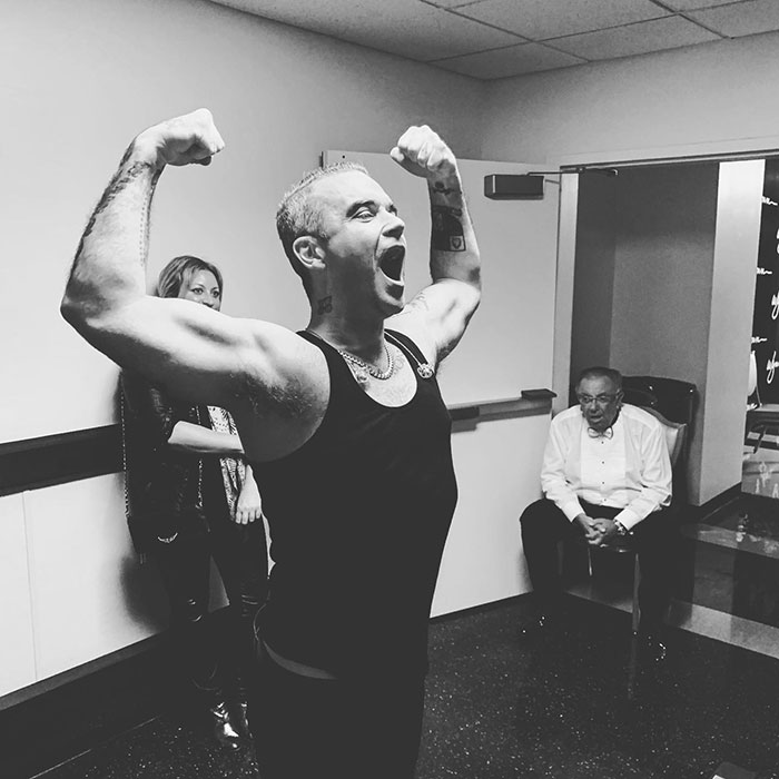 Robbie Williams Claims Rockstar Lifestyle From The 1990s Has Led To &ldquo;Manopause&rdquo;