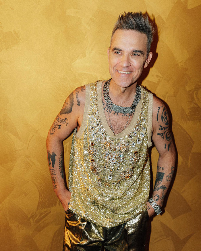 Robbie Williams Claims Rockstar Lifestyle From The 1990s Has Led To &ldquo;Manopause&rdquo;
