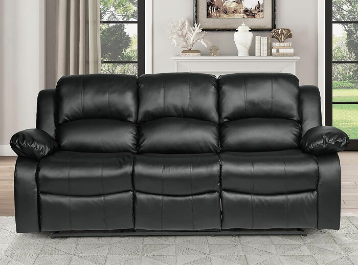 Lexicon small couch in black leather with plush cushions designed to maximize your space with style and comfort.