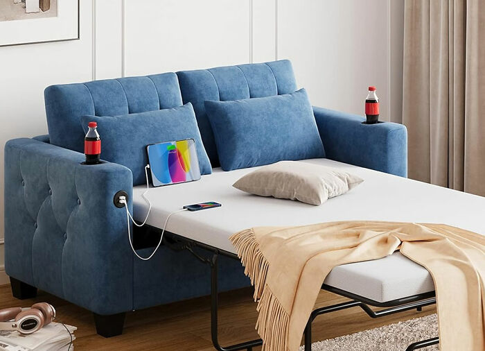 Blue LINSY Home small couch folding out with built-in USB ports for charging, maximizing space and style in a modern living room.