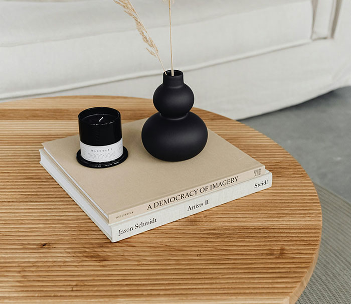 Candle on a book on the table 