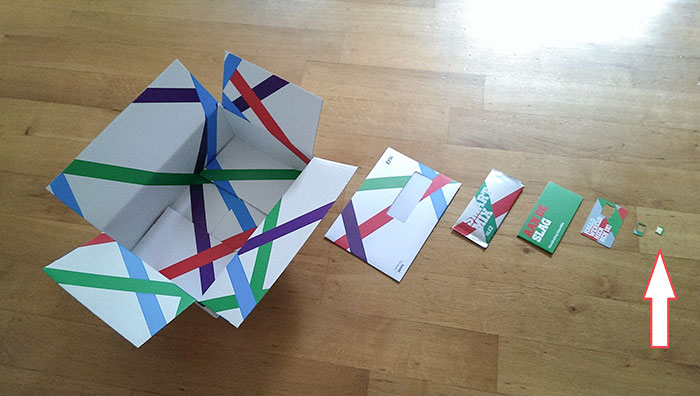 Unfolded product packaging pieces laid out in a sequence, illustrating a facepalm-worthy packaging fail.