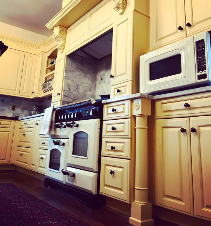 Light yellow cabinets in the kitchen
