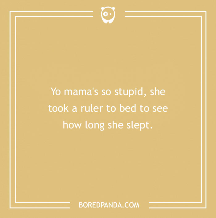 Yellow card with a "Yo mama" joke about sleeping with a ruler.