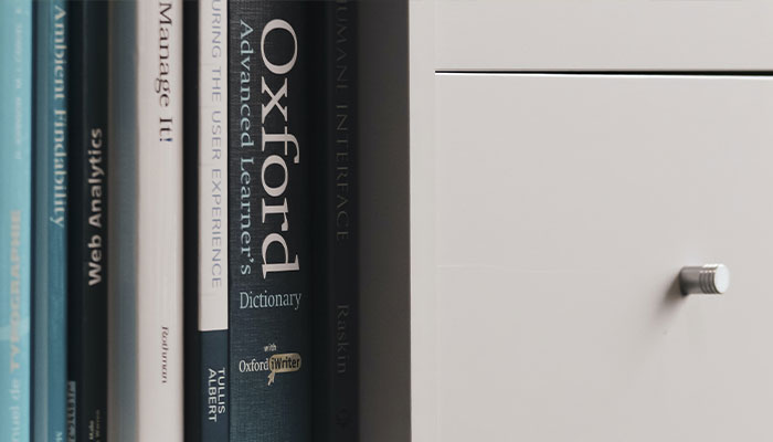 Oxford dictionary on a shelf, symbolizing Oxford University's focus on language and word selections. Oxford dictionary on a shelf, symbolizing Oxford University's focus on language and word selections.
