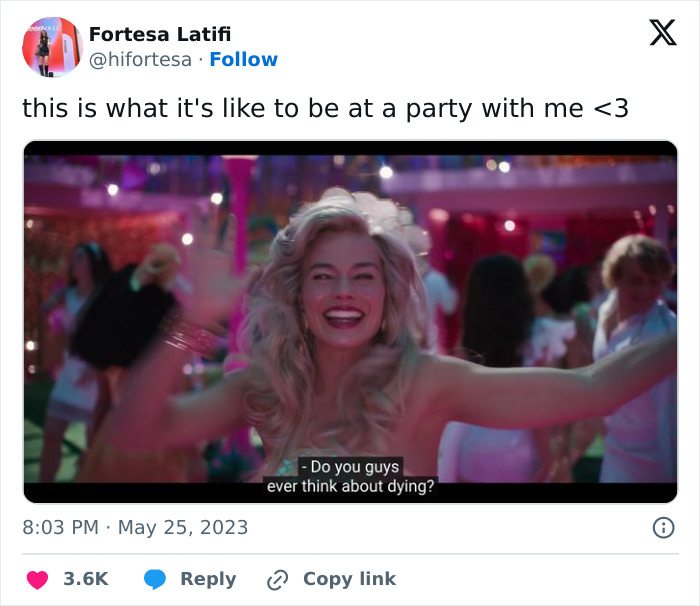 Funny meme from 2023 showing a woman with a big smile at a lively party, highlighting her humorous expression.