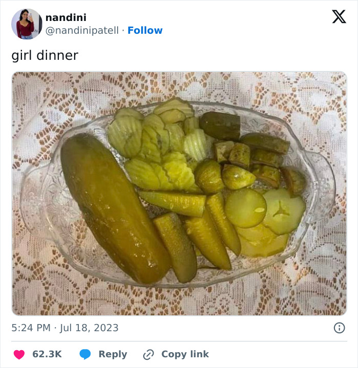 Plate of assorted pickles labeled "girl dinner" for funny memes 2023.