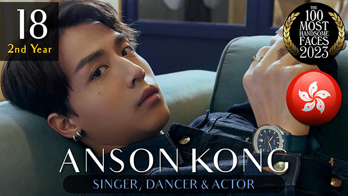 Man ranked in 'The Independent Critics' most handsome list 2023, lying on a sofa, wearing a dark jacket.