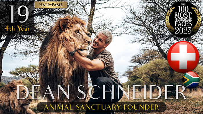 Man with a lion in nature setting, ranked among most handsome men of 2023.