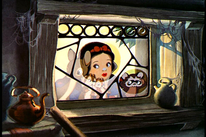 Animated scene showing a curious girl and animals peering through a dusty window, reflecting weird surprises in a new home.