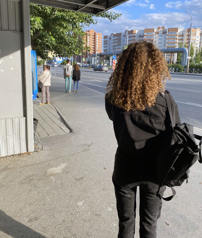 I Took A Picture Of My Sister And Noticed The Girl In The Distance Looks Just Like Her
