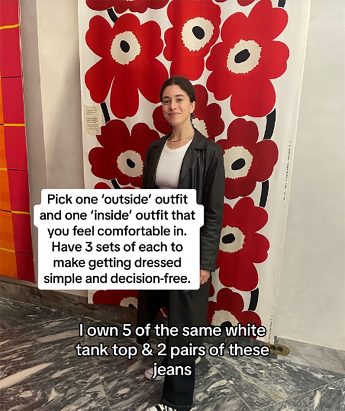 Woman in front of floral backdrop sharing burnout advice: "Be Boring" for simplicity in choosing daily outfits.