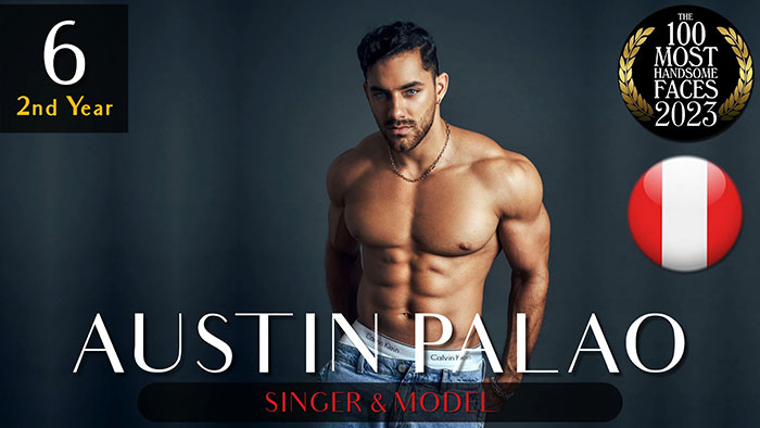 Shirtless man posed against dark background, muscular build.