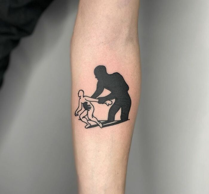 3D tattoo of a large figure pulling a smaller one, showcasing artistic creativity on an arm.
